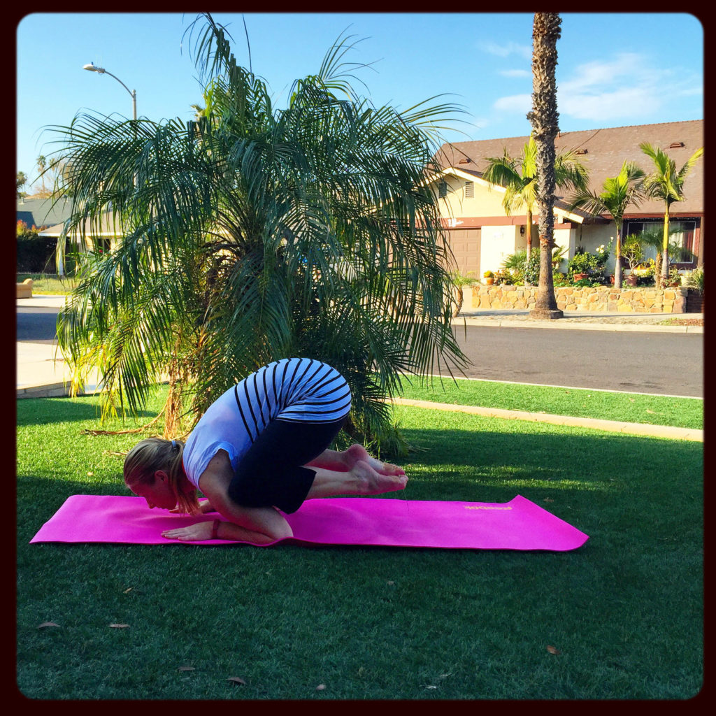 baby crow pose
