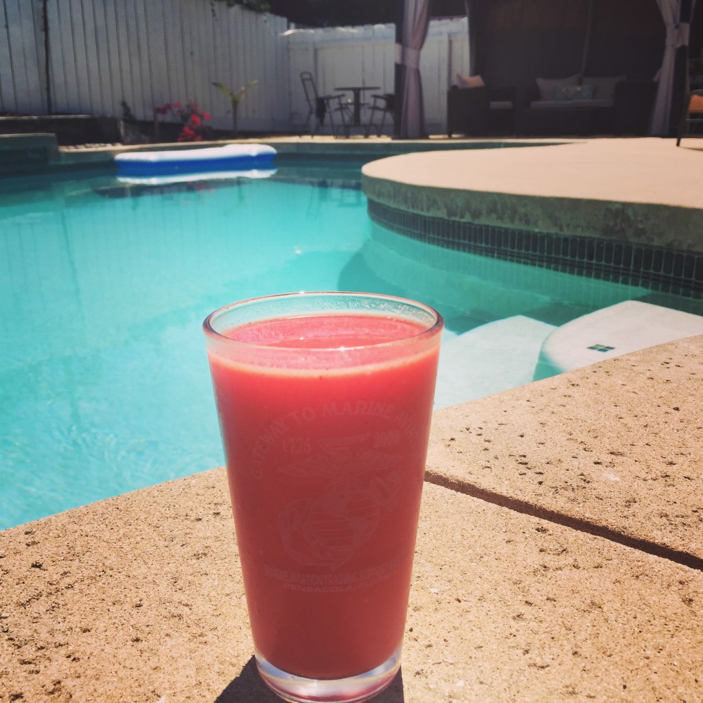 strawberry smoothie by the pool