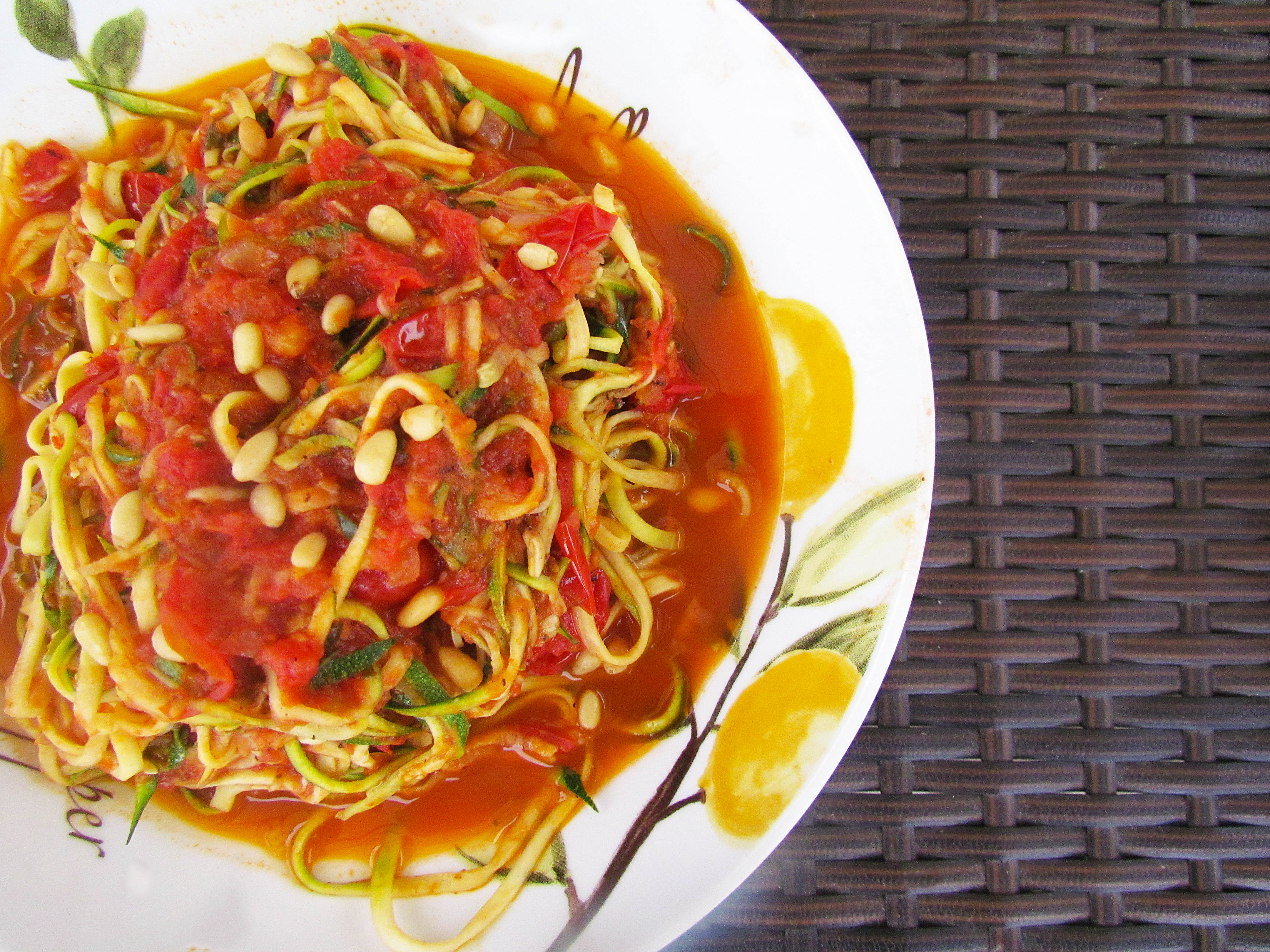 Zoodles with Basil Cherry Tomato Sauce, Pine Nuts & Lemon Zest